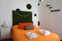 Postel nebo postele na pokoji v ubytování Mai City Apartment