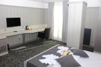 A television and/or entertainment centre at Anka Premium Hotel