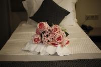 A bed or beds in a room at Anka Premium Hotel