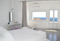 Posteľ alebo postele v izbe v ubytovaní Golden Beach Resort Anafi