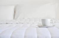 Posteľ alebo postele v izbe v ubytovaní Golden Beach Resort Anafi