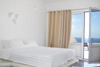Posteľ alebo postele v izbe v ubytovaní Golden Beach Resort Anafi