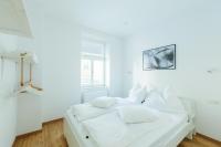 Posteľ alebo postele v izbe v ubytovaní The newPAST Apartments