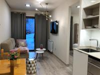 Kuchyň nebo kuchyňský kout v ubytování Villa de Plan Apartments&Suites