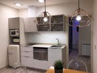Kuchyň nebo kuchyňský kout v ubytování Villa de Plan Apartments&Suites