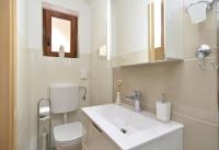 Kúpeľňa v ubytovaní Apartment Snjezana 1064