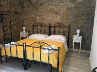 Posteľ alebo postele v izbe v ubytovaní B&B Antichi Cortili