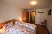 Łóżko lub łóżka w pokoju w obiekcie Bleierhof Apartment