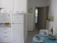 Kuchyň nebo kuchyňský kout v ubytování Apartments Kuzmanic