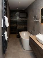 Een badkamer bij Hotel-Restaurant Het Rechthuis