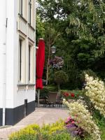 Een tuin van Hotel-Restaurant Het Rechthuis