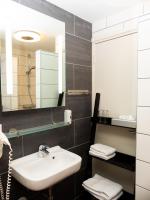 Een badkamer bij Hotel-Restaurant Het Rechthuis
