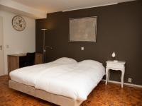 Een bed of bedden in een kamer bij Hotel-Restaurant Het Rechthuis