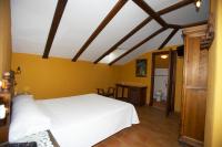 Postel nebo postele na pokoji v ubytování Hotel Posada San Antonio
