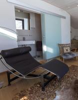 Posezení v ubytování Dreimäderlhaus - Das vegetarische Boutique Hotel