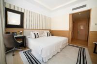 Postel nebo postele na pokoji v ubytování Gran Hotel Sardinero