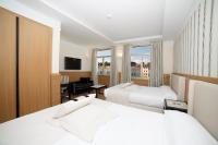 Postel nebo postele na pokoji v ubytování Gran Hotel Sardinero
