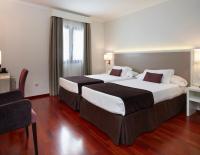 Posteľ alebo postele v izbe v ubytovaní Hotel Maestranza