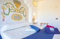 A bed or beds in a room at Hotel La Bitta - Bovis Hotels