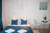 Posteľ alebo postele v izbe v ubytovaní Rába Apartman House