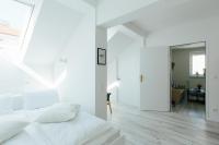 Posteľ alebo postele v izbe v ubytovaní The newPAST Apartments