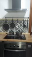 Kuchyň nebo kuchyňský kout v ubytování Apartamento Bianca