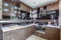 Kuchyň nebo kuchyňský kout v ubytování Apartament Coffee Zakopane