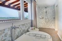 Łóżko lub łóżka w pokoju w obiekcie Boutiquehotel El Coto