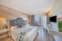 Łóżko lub łóżka w pokoju w obiekcie Boutiquehotel El Coto