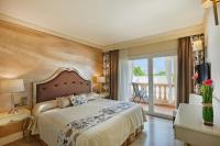 Łóżko lub łóżka w pokoju w obiekcie Boutiquehotel El Coto