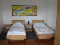 Katil atau katil-katil dalam bilik di Leier Business Hotel