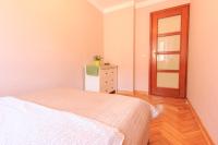Posteľ alebo postele v izbe v ubytovaní Rental Apartments Szeroki Dunaj