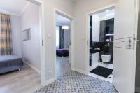 Posteľ alebo postele v izbe v ubytovaní Rental Apartments Krochmalna