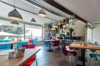 Reštaurácia alebo iné gastronomické zariadenie v ubytovaní Hotel Oleggio Malpensa