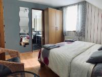 Postel nebo postele na pokoji v ubytování Apartmány v ráji (Českém)