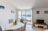 TV a/nebo společenská místnost v ubytování Apartmani Marinela