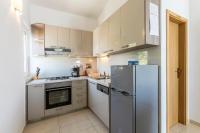 Kuchyň nebo kuchyňský kout v ubytování Apartmani Marinela
