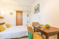 Postel nebo postele na pokoji v ubytování Apartment Andrea