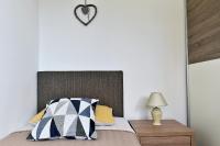 Posteľ alebo postele v izbe v ubytovaní Fran Green & Blue apartment