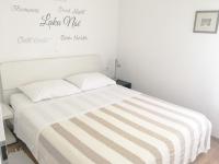 Posteľ alebo postele v izbe v ubytovaní Apartment Sol - 5m from the sea