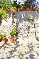 A garden outside Holiday Home Vilata