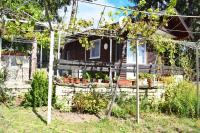 A garden outside Holiday Home Vilata