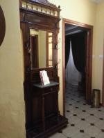 a room with a large mirror and a hallway at Casa Rural La Verdura in Ubrique