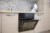 A kitchen or kitchenette at Marta House