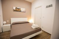 A bed or beds in a room at Marta House