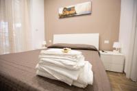 A bed or beds in a room at Marta House