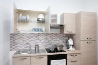 A kitchen or kitchenette at Marta House