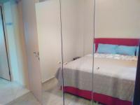 Łóżko lub łóżka w pokoju w obiekcie City House Apartment