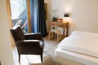 Łóżko lub łóżka w pokoju w obiekcie Alpine Spa Hotel Haus Hirt