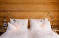 Łóżko lub łóżka w pokoju w obiekcie Alpine Spa Hotel Haus Hirt
